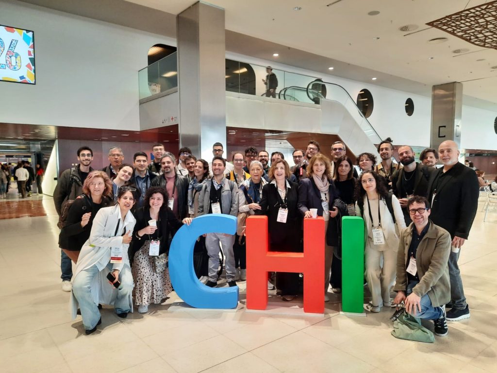 Group photo of Italian researchers participating in the CHI 2026 conference in Barcelona, Spain.